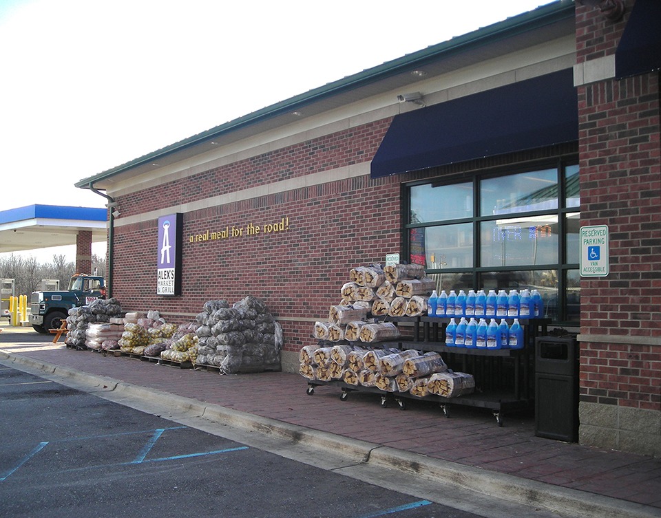 plastic display in front of a gas station