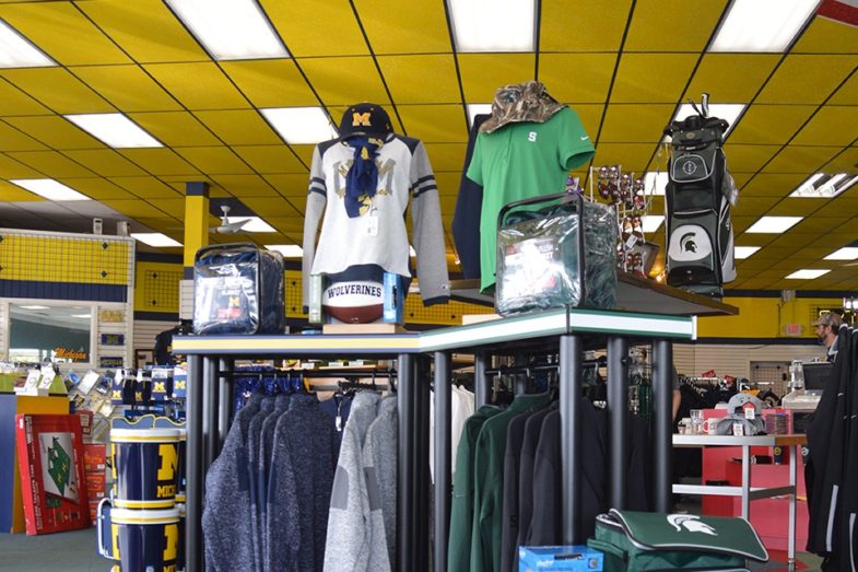 College fan apparel on display in a clothing store