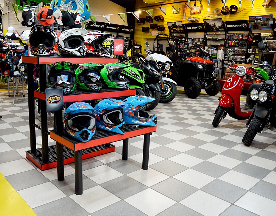 helmets displayed on plastic three-tier display