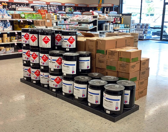 Hardware store display with buckets and boxes