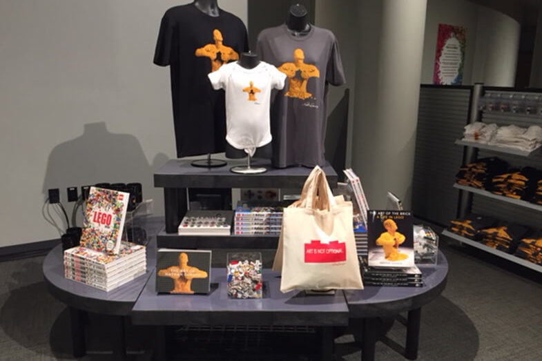 Displays with books, t-shirts and reusable bags