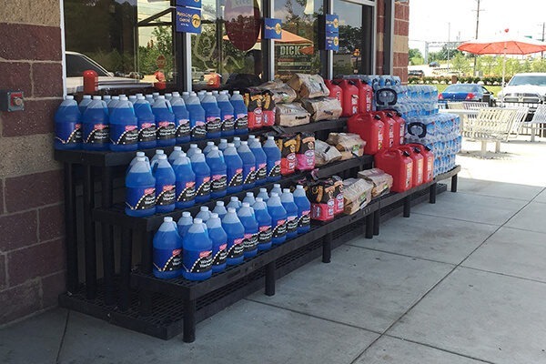 Display of windshield wiper fluid outside of a convenience store